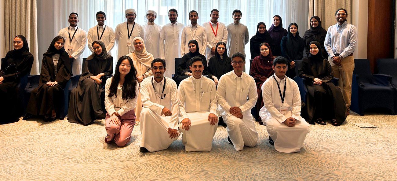 A workshop group gathered together after a session in Dubai