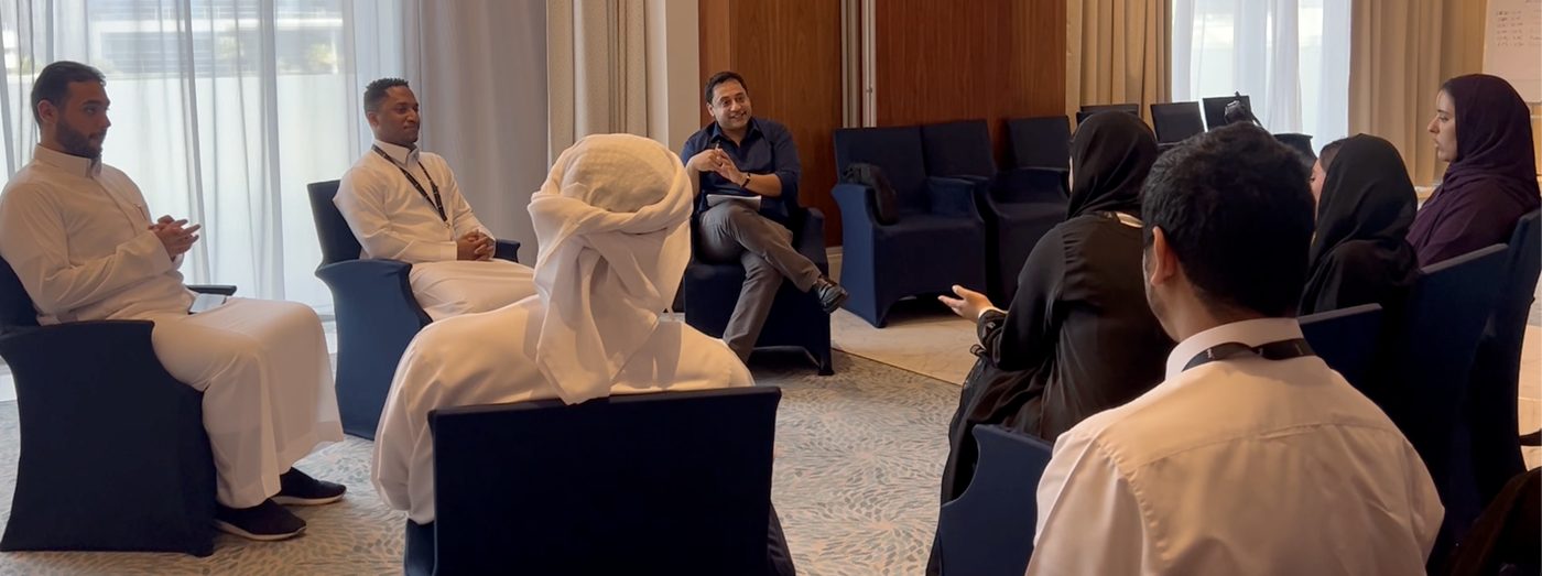 Salman Qureshi facilitating a group conversation